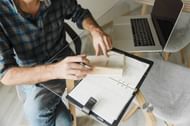 It's essential to be honest when recording your workouts in your journal. If you skipped a workout or didn't perform as well as you'd hoped, write it down (Arina Krasnikova/ Pexels)